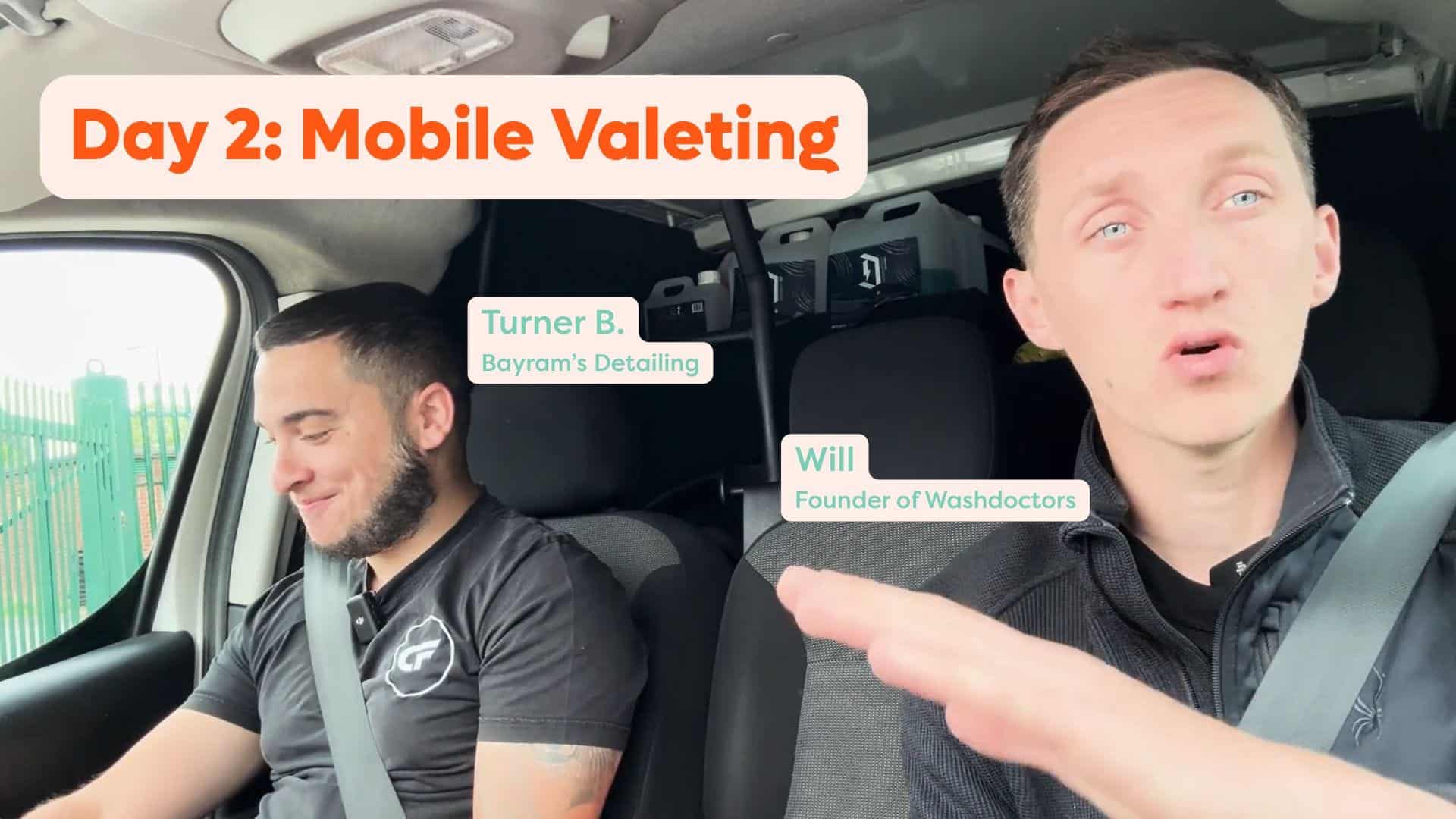 Mobile valeting service in progress with two technicians in a van.